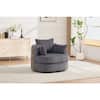 Modern gray corduroy swivel chair in a living room interior.