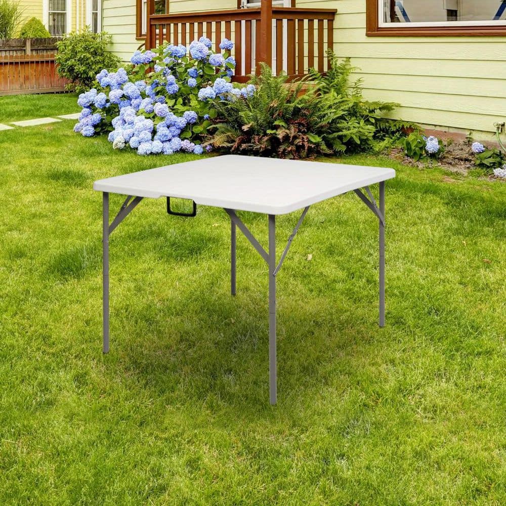 Cisvio Outdoor Square Steel Picnic Table on a grassy garden