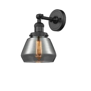 Franklin Restoration Fulton 7 in. 1-Light Matte Black Wall Sconce with Plated Smoke Glass Shade
