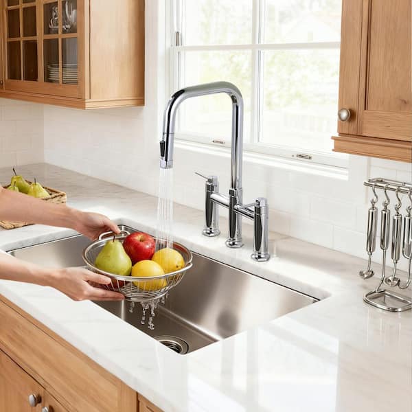 Brass Double Handle Deck Mounted Bridge Kitchen Faucet with Pull-Down Spray Head in Polished Chrome