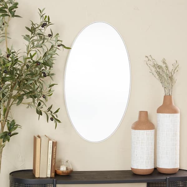 Litton Lane 32 in. x 18 in. Oval Round Framed White Wall Mirror with Thin Minimalistic Frame