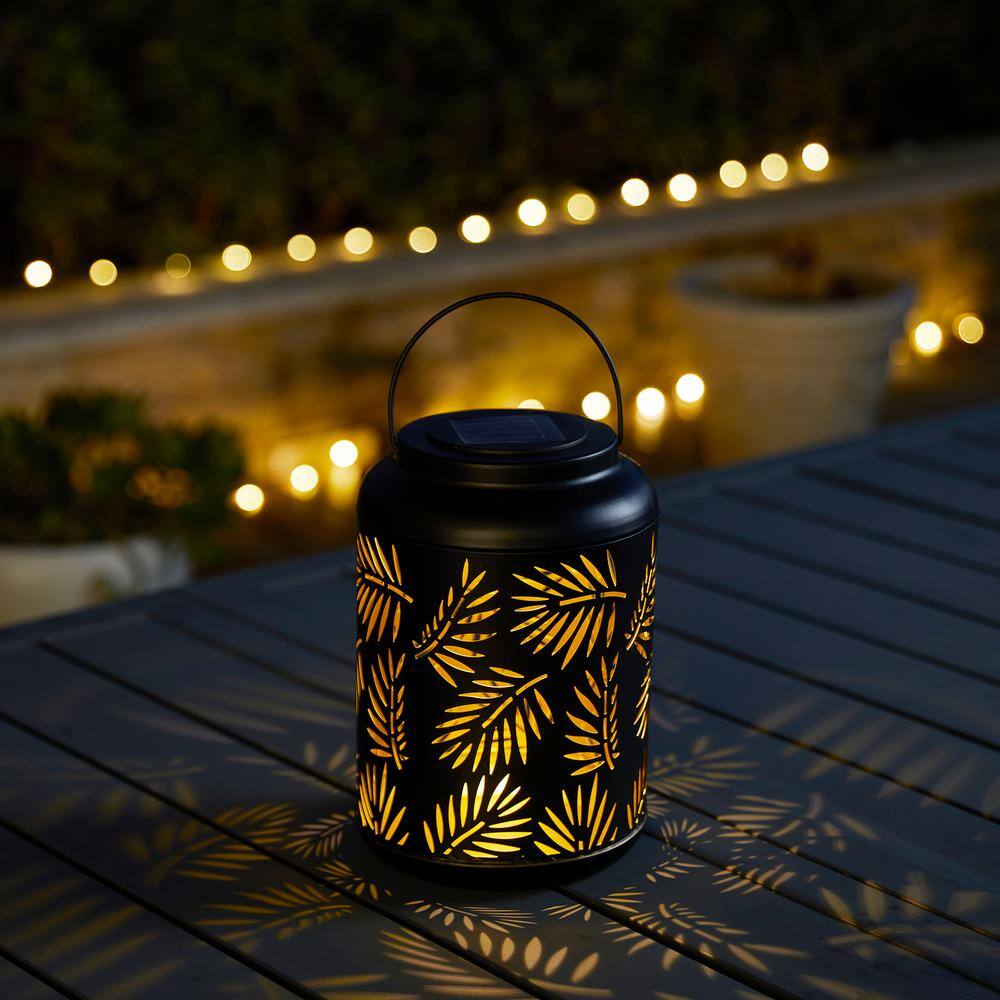 Black Metal Cylinder Solar Powered Outdoor Lantern with Leaf Cutouts