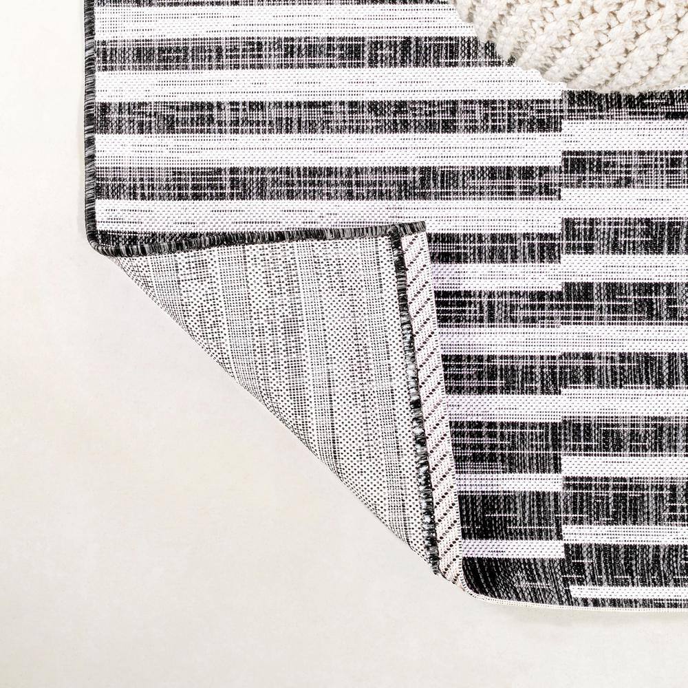 Ivory and Black Stripe Synthetic 8' x 10' Easy-Care Rug