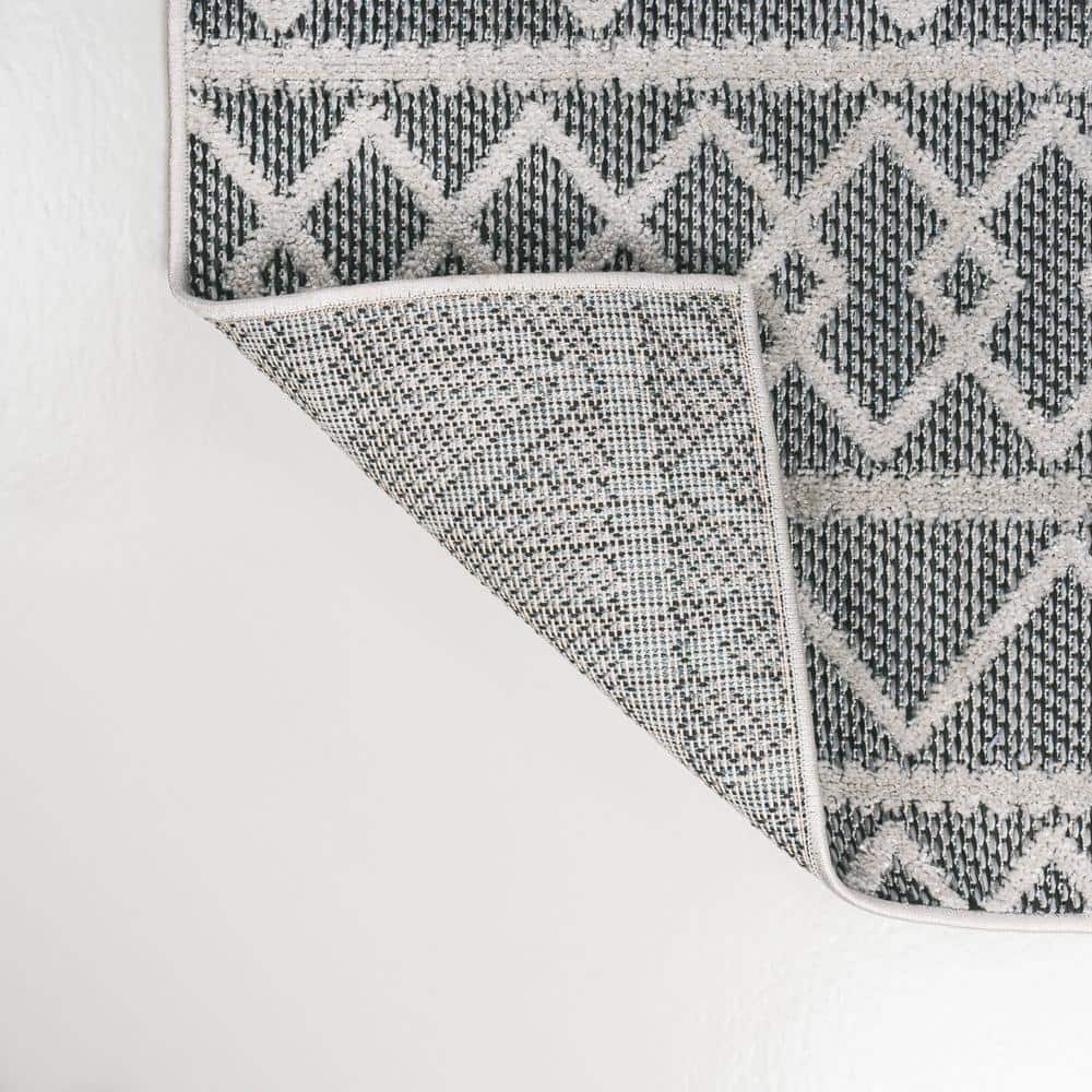 Aylan Black/Ivory Geometric High-Low Pile Synthetic Indoor/Outdoor Rug