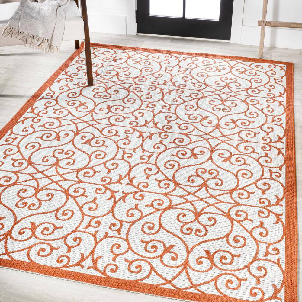 Cream and Orange 8' x 10' Synthetic Flat Woven Reversible Rug