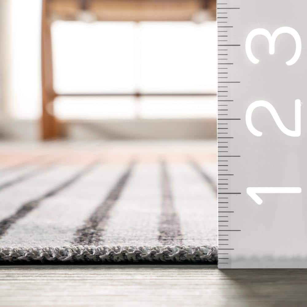Burnt Orange and Dusty White Abstract 6' x 9' Synthetic Area Rug