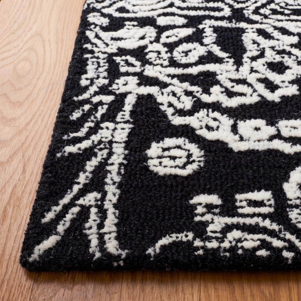 Black and Ivory Floral Hand-Tufted Wool 6' x 9' Area Rug