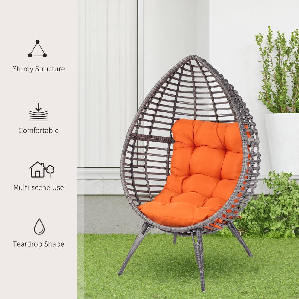 Gray Wicker Teardrop Chair with Orange Cushions