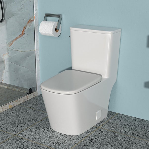 1-piece 1.28 GPF Single Flush Elongated Toilet in White Seat Included