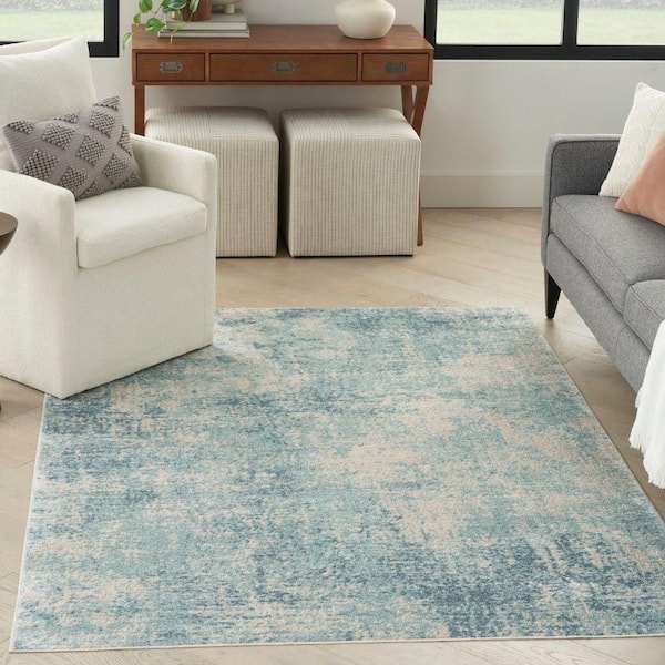 Astra Machine Washable 5 ft. x 7 ft. Blue Ivory Abstract Contemporary Area Rug