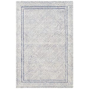 Abstract Ivory/Navy 3 ft. x 5 ft. Border Geometric Area Rug