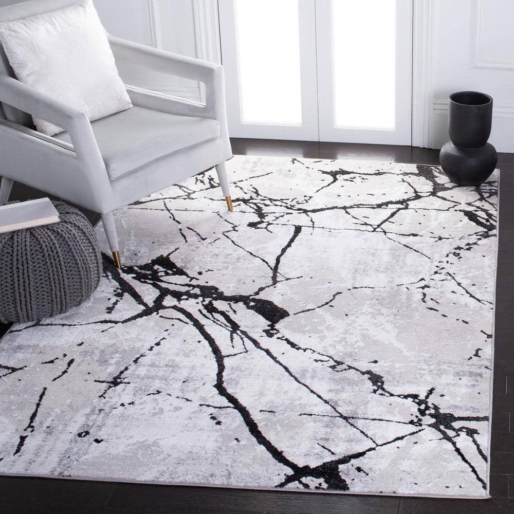 Handmade Round Gray and Black Abstract Synthetic Rug