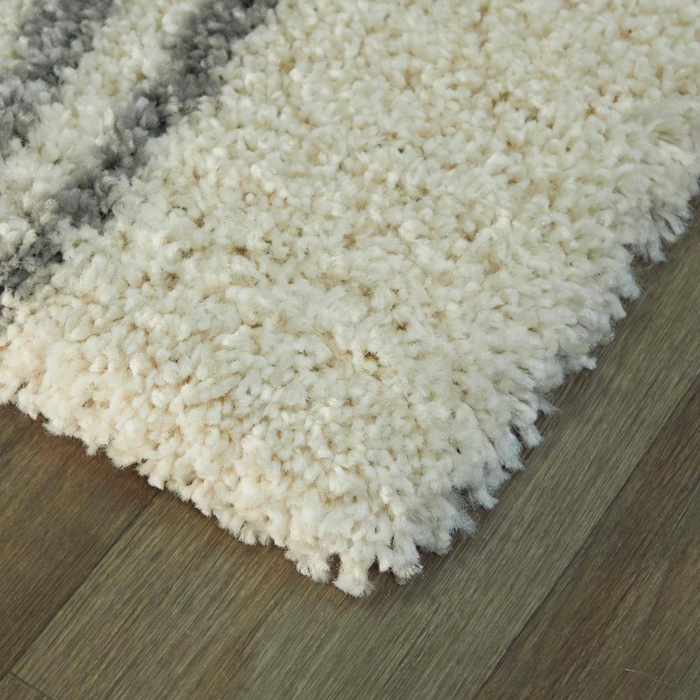 White and Grey Geometric Shag Synthetic 6' x 9' Area Rug