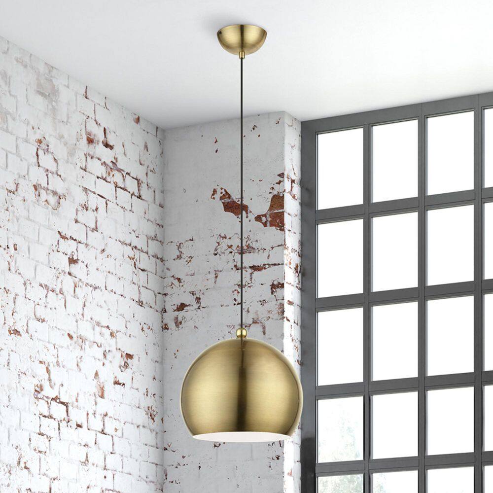Antique Brass and Polished Brass Globe Pendant Light