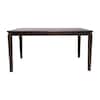 Dark wood dining table on a white background.