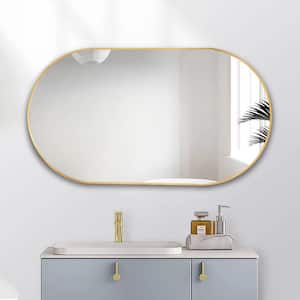 Yarbro 36 in. W x 18 in. H Large Oval Stainless Steel Metal Framed Wall Bathroom Vanity Mirror in Gold