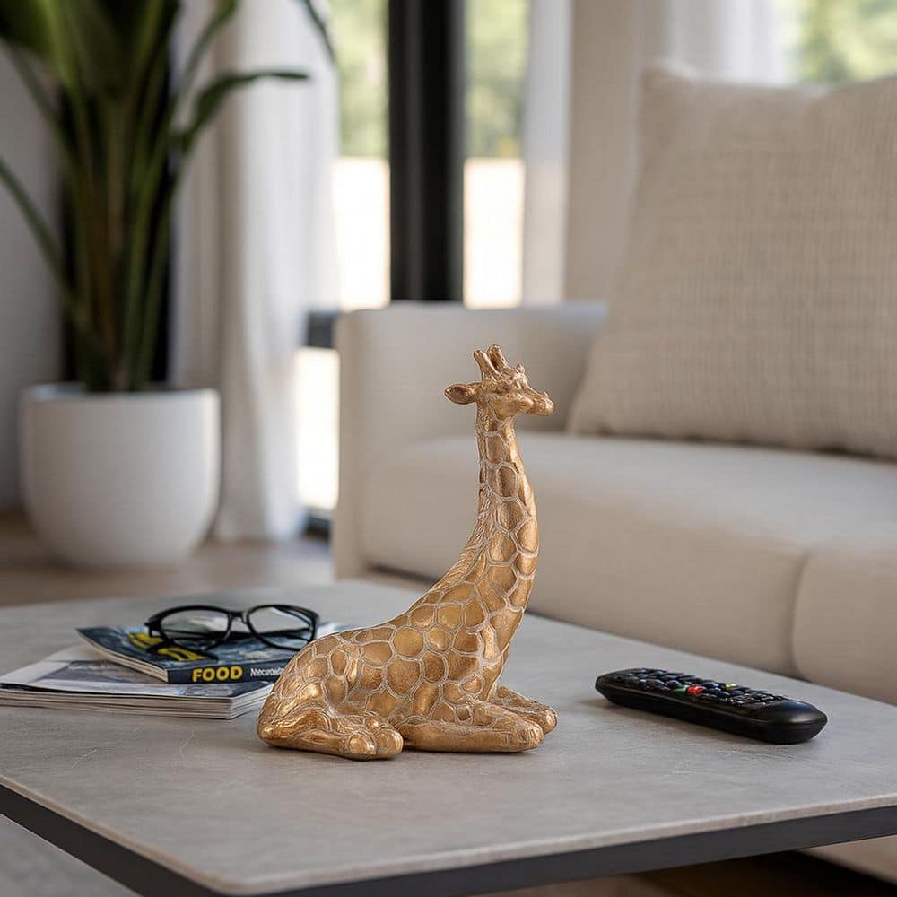 Liv & Skye Gold 8 in. x 10 in. Resin Sitting Giraffe Figurine