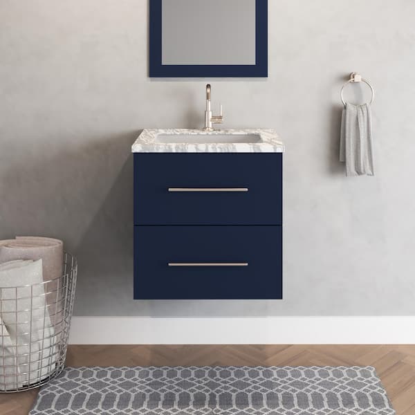 VOLPA USA AMERICAN CRAFTED VANITIES Napa 24 in. W x 22 in. D x 21.75 in. H Single Sink Bath VanityWall in Navy Blue with White Carrera Marble Countertop