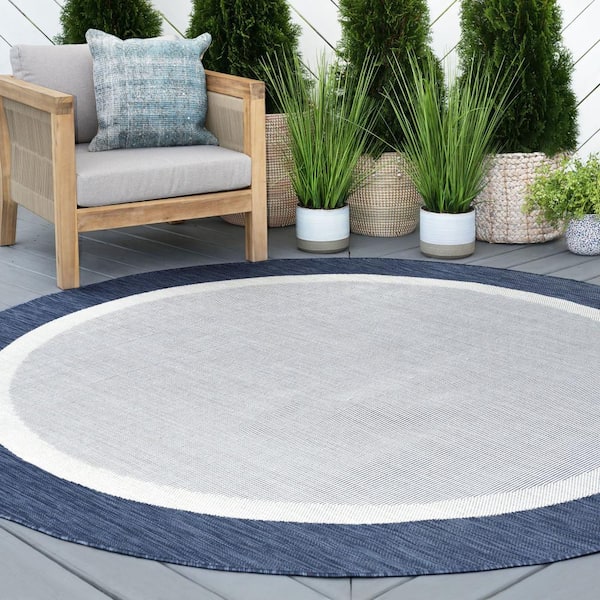Eco Solid Border Navy 6 ft. Round Indoor/Outdoor Area Rug