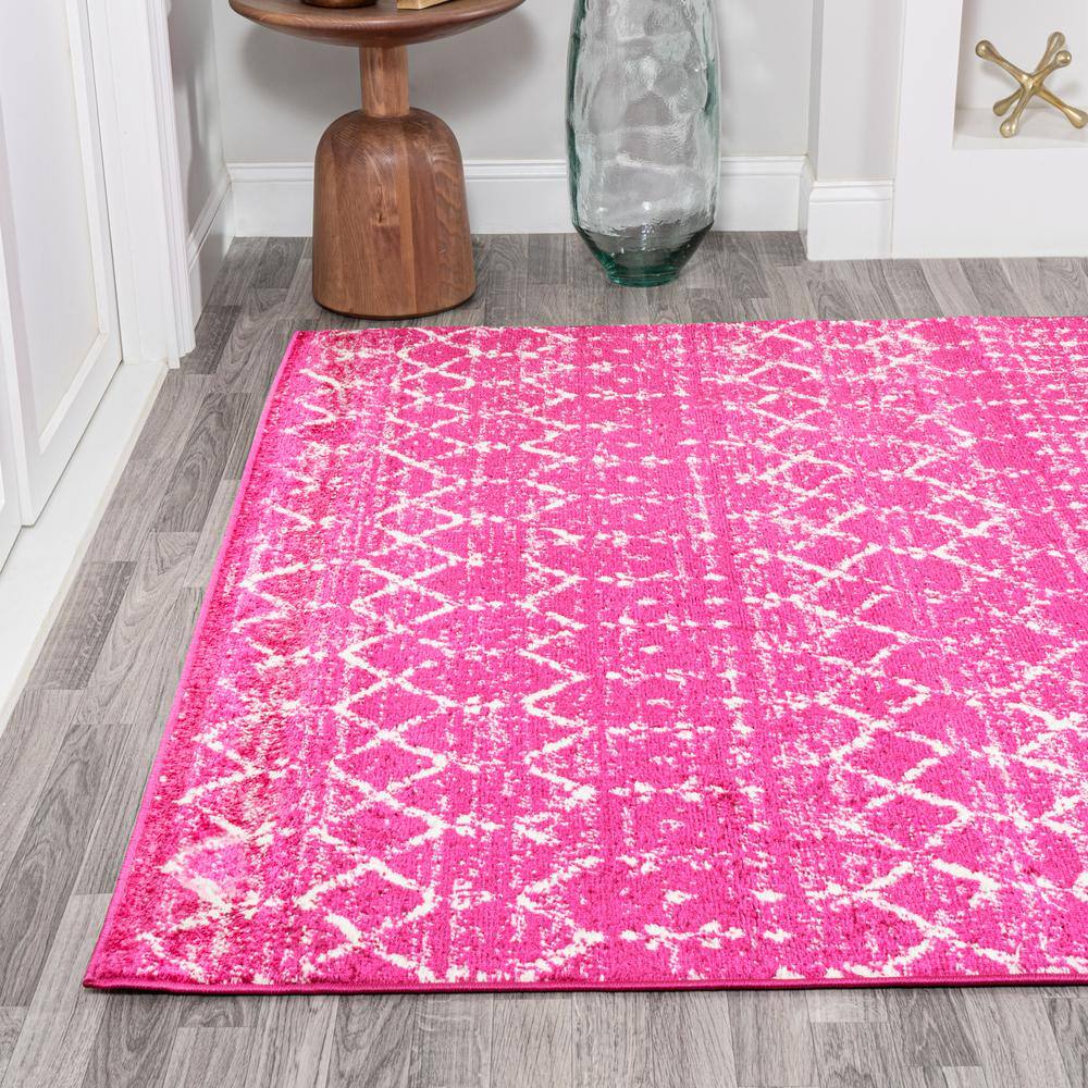 8' x 10' Fuchsia and Ivory Synthetic Moroccan Trellis Area Rug