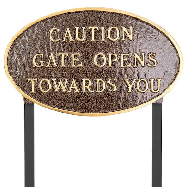 Montague Metal Products 10 in. x 18 in. Large Oval Caution Gate Opens Towards You Statement Plaque Sign with Lawn Stakes - Hammered Bronze