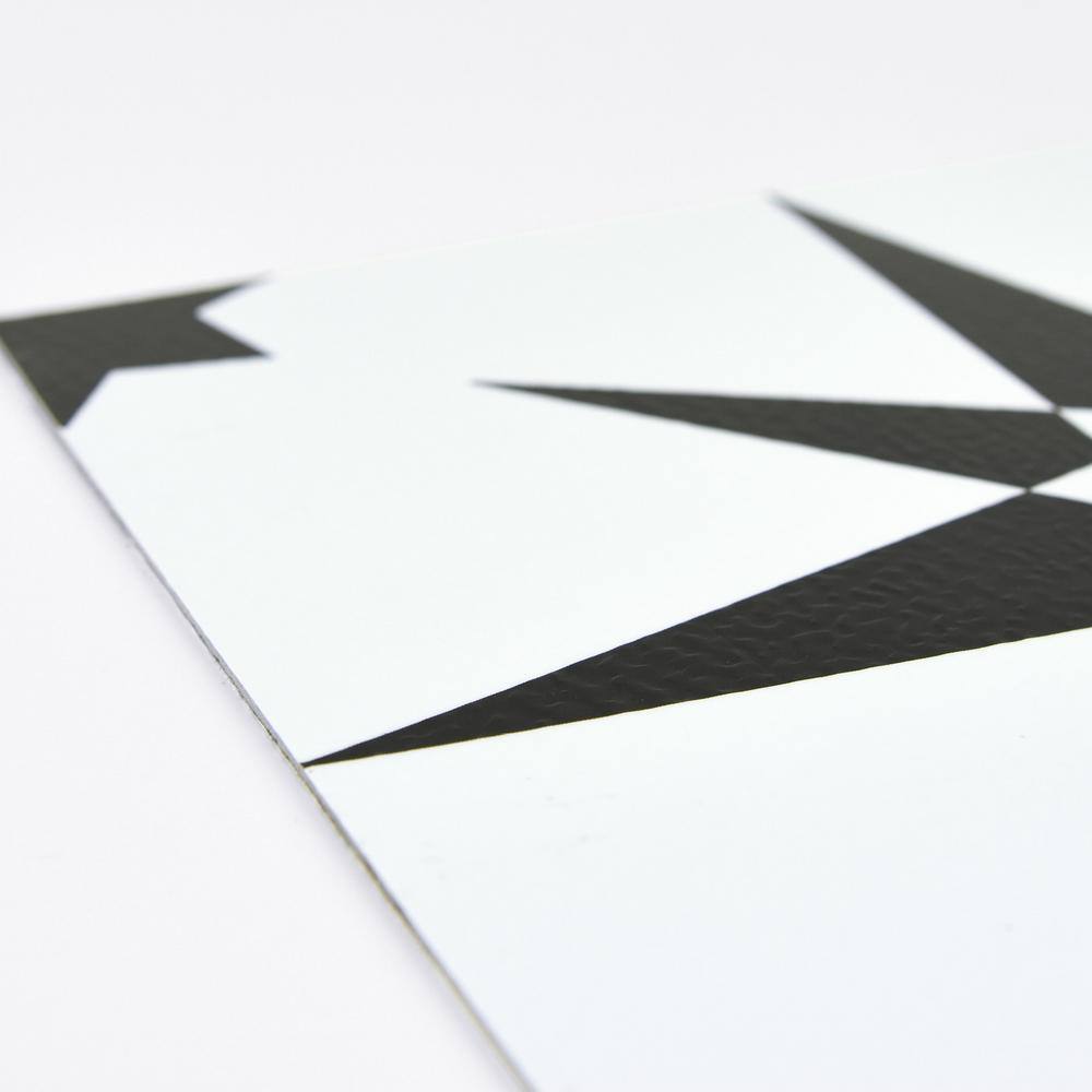 Altair Black and White Quilted Star 12'' Square Peel & Stick Floor Tiles