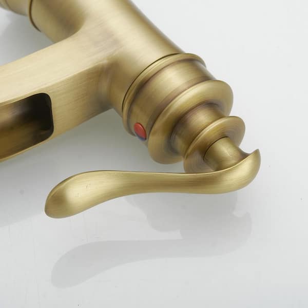 Waterfall Single Hole Single-Handle Low-Arc Bathroom Faucet With Pop-Up Drain Assembly in Antique