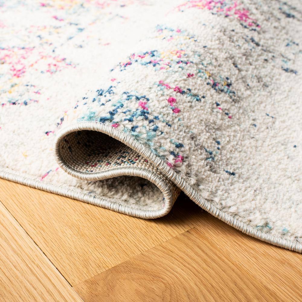 Ivory and Multicolor Geometric Wool and Synthetic 10' x 14' Area Rug