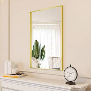 24 in. W x 36 in. H Gold Aluminum Rectangle Framed Tempered Glass Wall-mounted Mirror