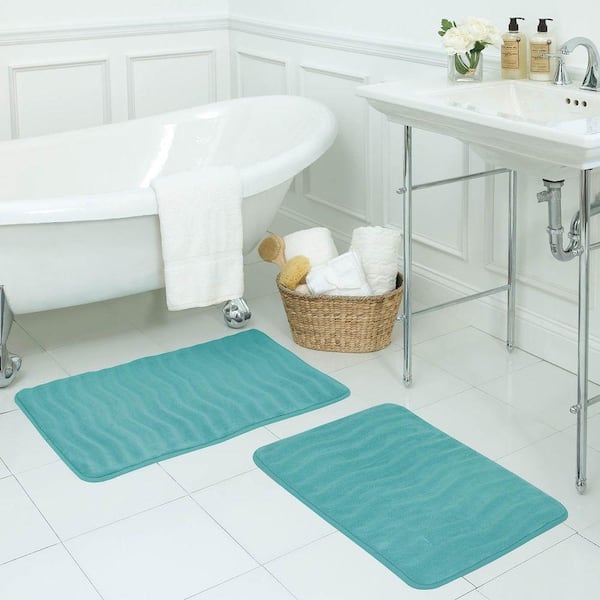 https://images.thdstatic.com/productImages/f6a3b628-80c9-40be-8e7c-a5253e80326e/svn/marine-blue-bouncecomfort-bathroom-rugs-bath-mats-ymb002046-4f_600.jpg