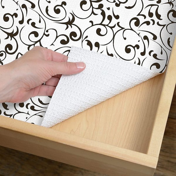 https://images.thdstatic.com/productImages/f6bdedf2-cfc9-4194-9013-c0bab8e7e233/svn/black-and-white-floral-con-tact-shelf-liners-drawer-liners-08f-c8ar6-04-c3_600.jpg