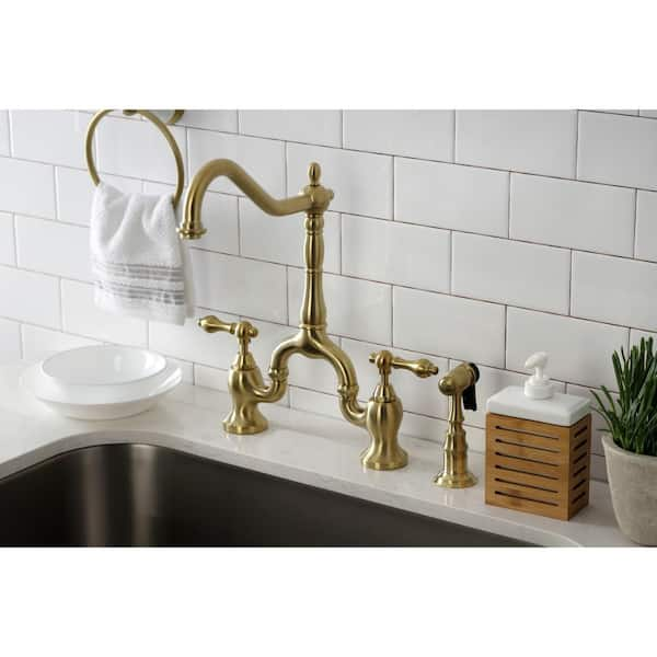 English Country Double-Handle Deck Mount Gooseneck Bridge Kitchen Faucet with Brass Sprayer in Brushed Brass