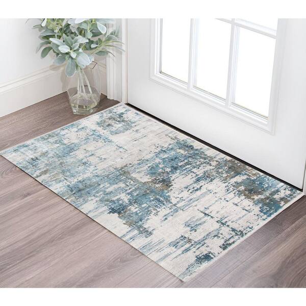 2 ft. x 3 ft. Ivory Blue And Brown Abstract Area Rug With Fringe