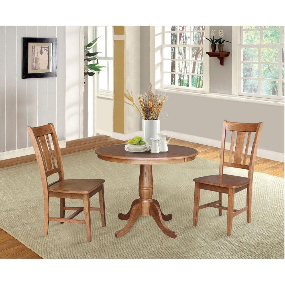 Elegant Round Oak Extendable Dining Table with Drop Leaf