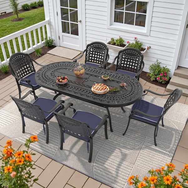 Isabella Black 7-Piece Cast Aluminum Outdoor Dining Set with Oval Table and Dining Chairs and Blue Seat Cushion