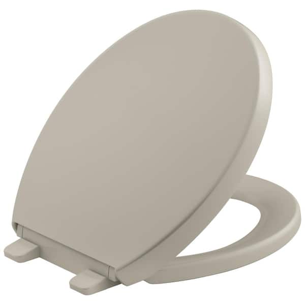 KOHLER Reveal Quiet-Close Round Closed Front Toilet Seat with Grip-tight Bumpers in Sandbar