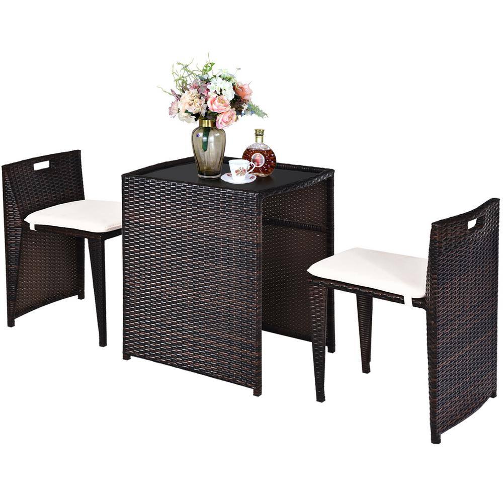 Compact Brown Wicker Outdoor Patio Set with Cushions and Glass Table