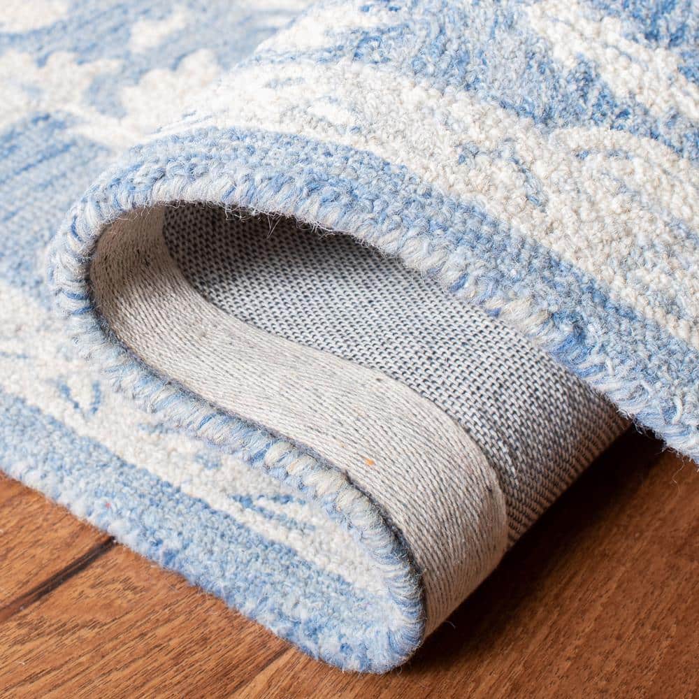 Ivory and Blue Handmade Wool Medallion Area Rug