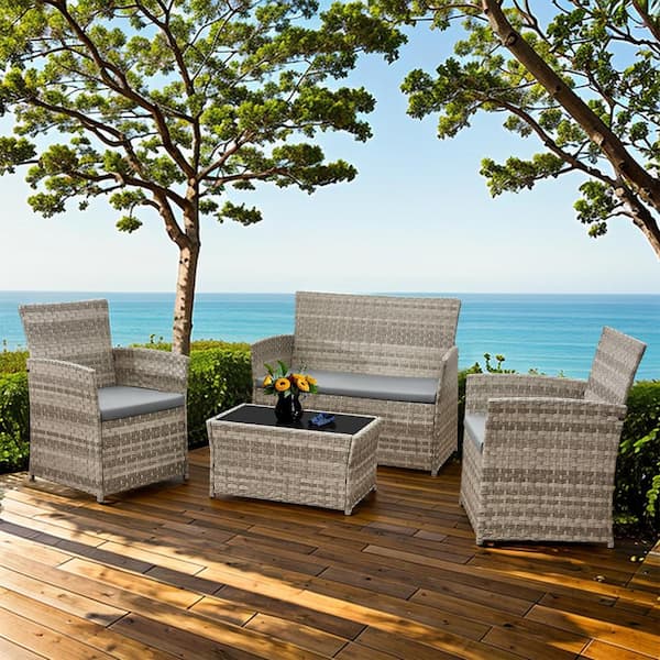 Zeus & Ruta 4-Pieces Gray Wicker Patio Conversation Set Sofa set with Gray Cushions, 1 Coffee Table