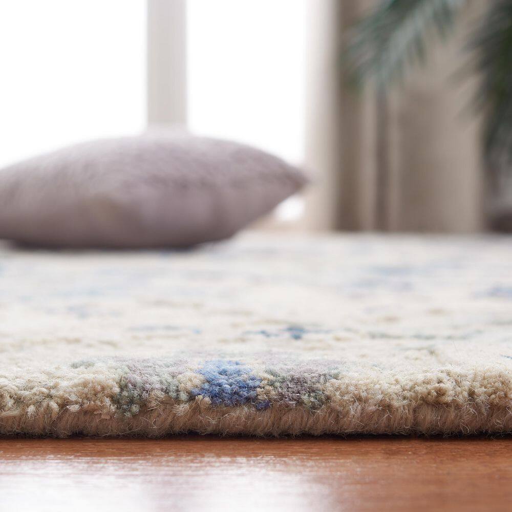 Beige and Blue 9' x 12' Hand-Tufted Wool Area Rug