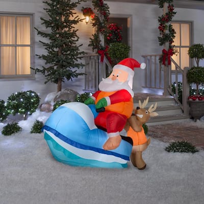 5 ft Pre-Lit LED Santa on Watercraft Sleigh Scene Inflatable