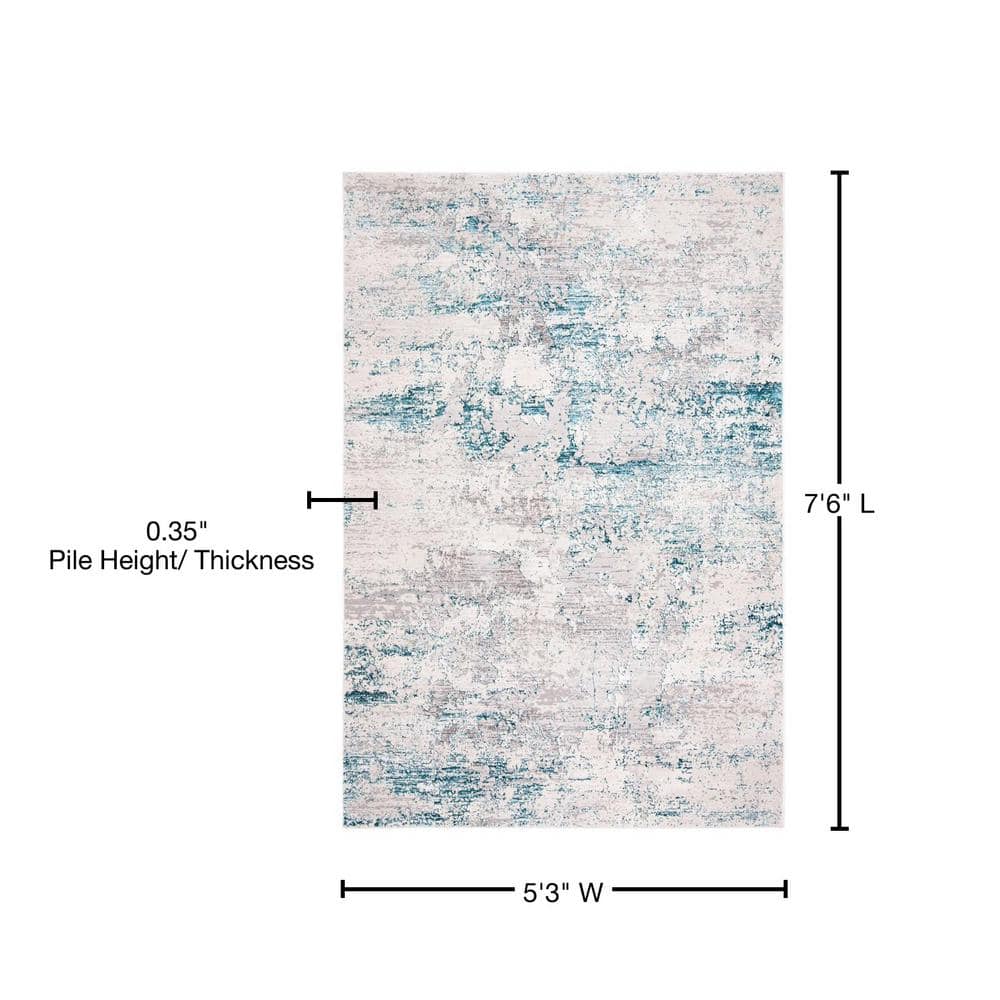 Cream and Turquoise Abstract Rectangular Area Rug 5'3" x 7'6"