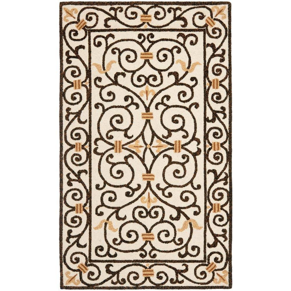 SAFAVIEH Chelsea Ivory/Dark Brown 3 ft. x 4 ft. Border Area Rug 100% pure virgin wool pile, hand-hooked to a durable cotton backing. American Country and turn-of-the-century European designs. This collection is handmade in China exclusively for Safavieh. This is a great addition to your home whether in the country side or busy city. Color: Ivory/Dark Brown.