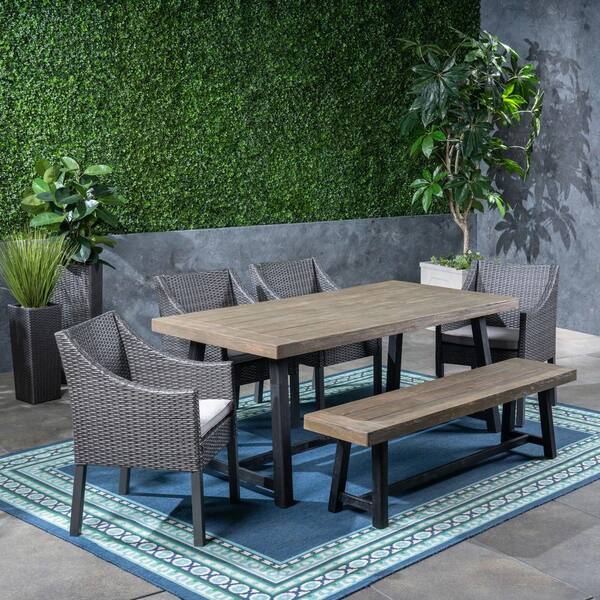 Noble House Calero Sandblast Grey 6-Piece Wood and Grey Faux Rattan Outdoor Dining Set with Silver Cushions