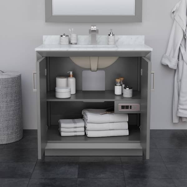 https://images.thdstatic.com/productImages/f7bb698e-31a7-4e3d-81ef-a162304c40d0/svn/wyndham-collection-bathroom-vanities-with-tops-wcf414136skgc2unsm34-4f_600.jpg