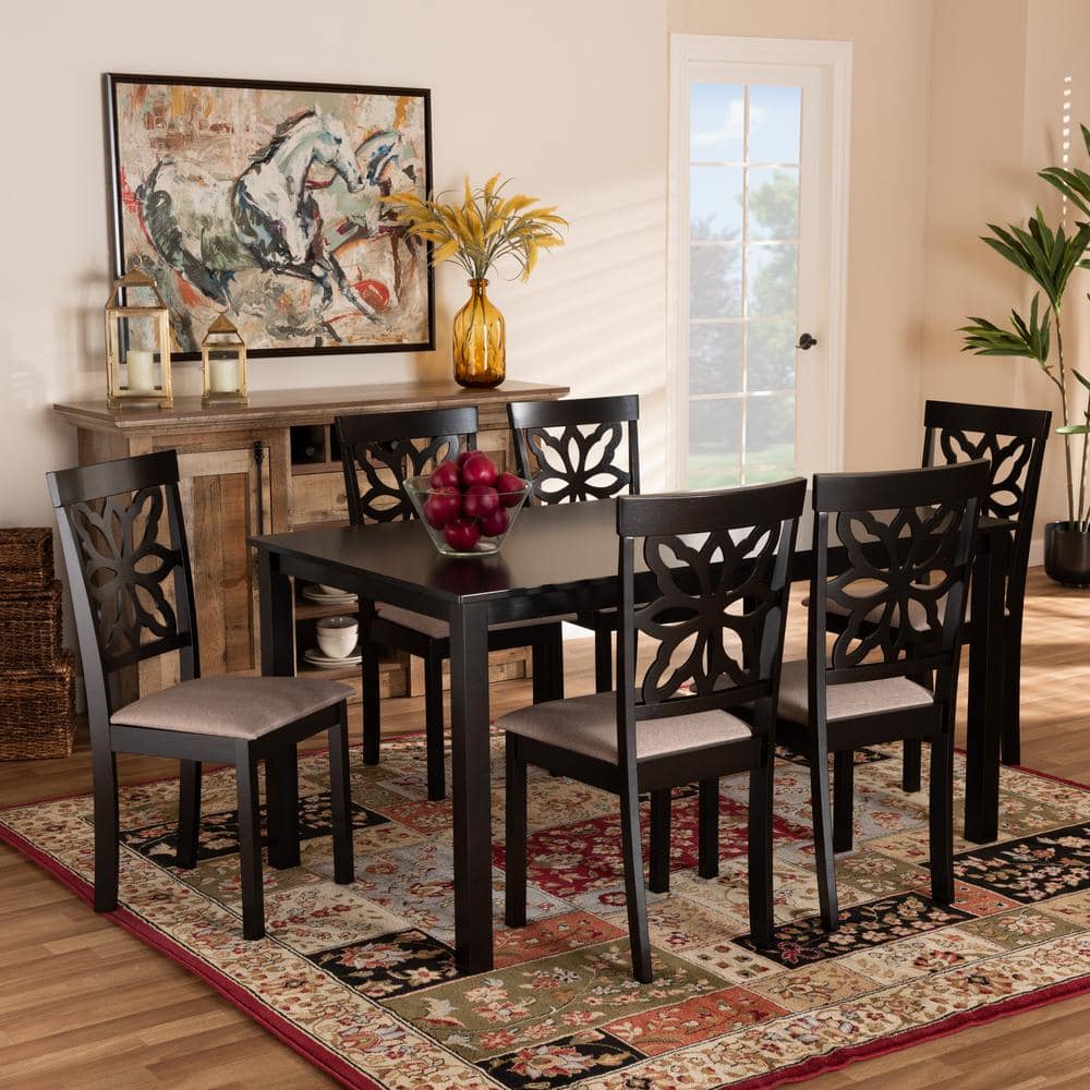 The Dallas dining set arranged in a dining room with a rug and sideboard.