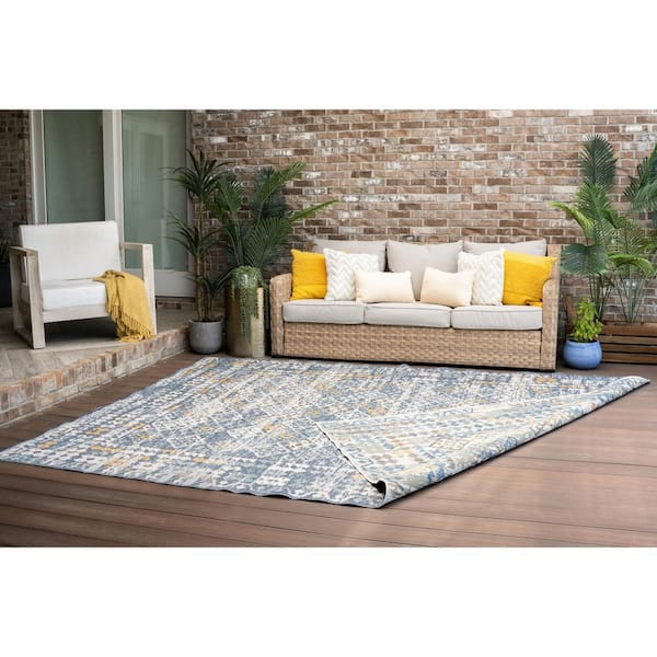 https://images.thdstatic.com/productImages/f7f6ad68-d804-5edf-a1c0-c972b7fb604e/svn/navy-tayse-rugs-outdoor-rugs-flo1107-8x10-fa_600.jpg