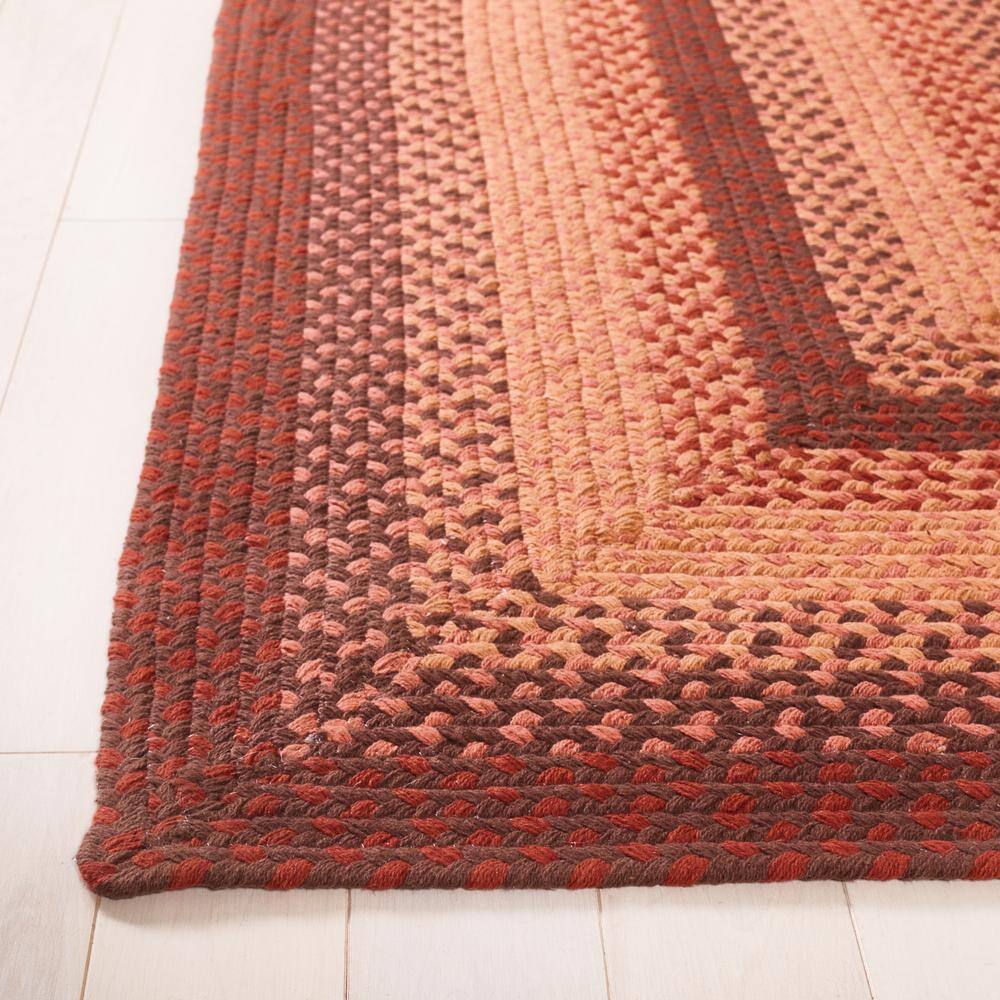 Handwoven Orange and Rust Braided Cotton Area Rug 4' x 6'