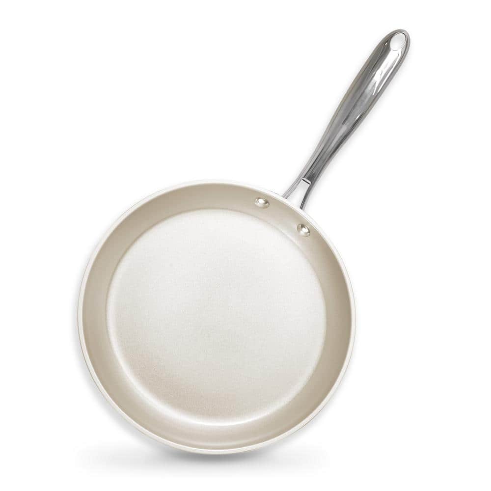 https://images.thdstatic.com/productImages/f82ac60a-3e8a-4cdd-b564-a8f712c4f855/svn/cream-stainless-steel-gotham-steel-skillets-2158-64_1000.jpg