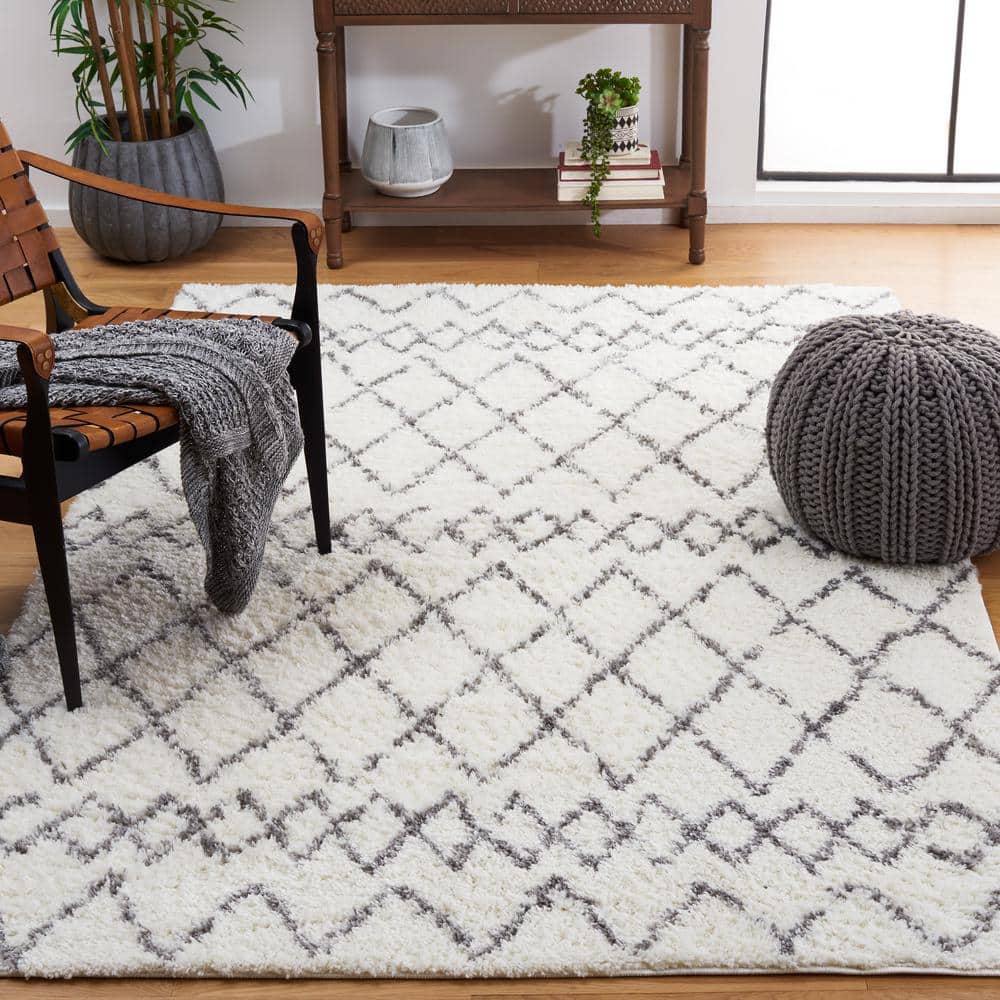 Cream and Light Grey 8' x 10' Shag Synthetic Area Rug